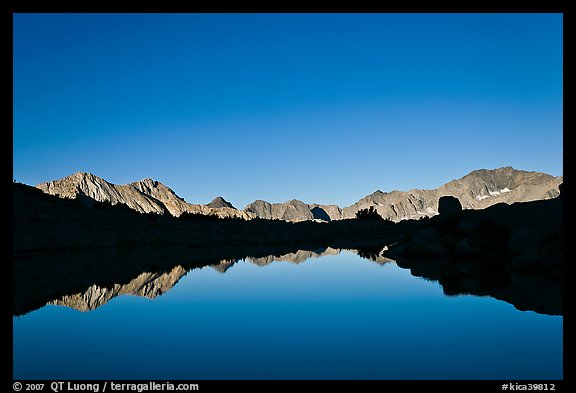 Mountain range reflected in calm lake, Dusy Basin. Kings Canyon National Park (color)