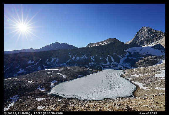 Sun and frozen lake from Forester Pass. Kings Canyon National Park (color)