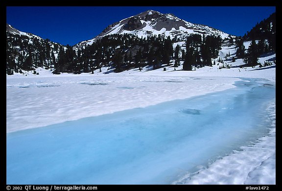 Turquoise melting snow in lake Helen and Lassen Peak, late spring. Lassen Volcanic National Park (color)