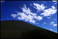 Smooth cinder cone profile and clouds. Lassen Volcanic National Park, California, USA. (color)