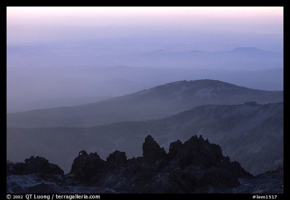 Ridges and volcanic rocks from  summit of Lassen Peak, sunset. Lassen Volcanic National Park, California, USA.