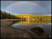 Rainbow in dark sky above Juniper Lake. Lassen Volcanic National Park ( color)
