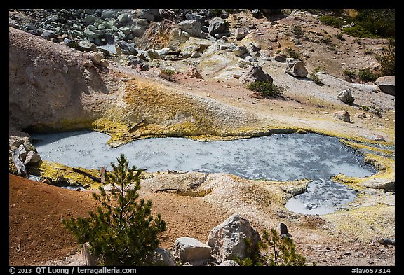 Boiling mud pot and colorful mineral deposits. Lassen Volcanic National Park, California, USA.