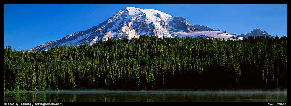Mount Rainier raising above forest and lake. Mount Rainier National Park (color)