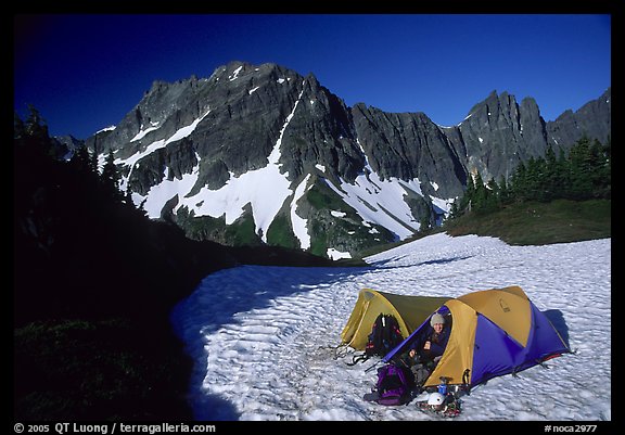 Camping on neve below Sahale Peak, North Cascades National Park.  (color)