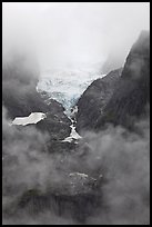 Hanging glacier in fog, North Cascades National Park.  ( color)