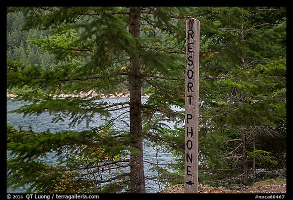 Sign pointing to phone used to call Ross Lake resort, North Cascades National Park Service Complex.  (color)