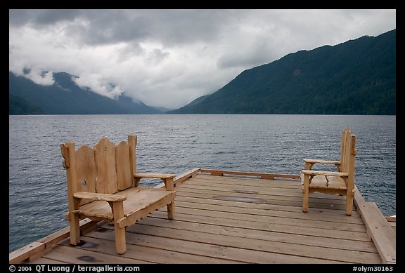 Two chairs on pier, Crescent Lake. Olympic National Park, Washington, USA.