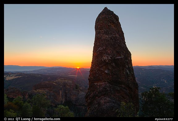 Rock pillar and setting sun. Pinnacles National Park, California, USA.