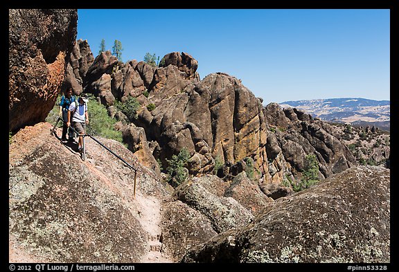 Hikers on rugged section of High Peaks trail. Pinnacles National Park, California, USA.