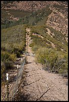 Boundary fence on steep hillside. Pinnacles National Park, California, USA. (color)
