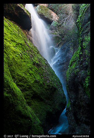 Waterfall spilling down from reservoir into Bear Gulch Cave. Pinnacles National Park (color)