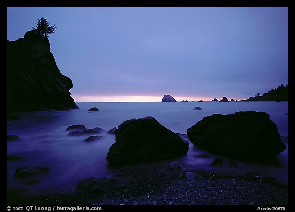 Rocks and seastacks, cloudy sunset, Hidden Beach. Redwood National Park, California, USA.
