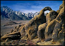 Rock arch and Sierra Nevada range with Mt Whitney, morning. Sequoia National Park, California, USA.