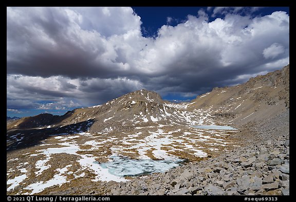 High Sierra landscape with frozen tarns and afternoon clouds. Sequoia National Park (color)