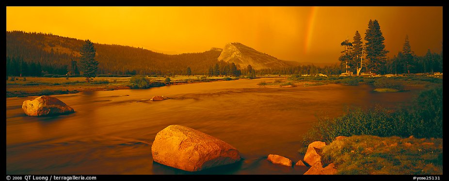 Tuolumne Meadows, Lembert Dome, and rainbow, storm clearing at sunset. Yosemite National Park, California, USA.