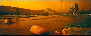 Tuolumne Meadows, Lembert Dome, and rainbow, storm clearing at sunset. Yosemite National Park (Panoramic color)