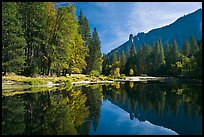Merced River with fall colors and Sentinel Rocks reflections. Yosemite National Park, California, USA. (color)