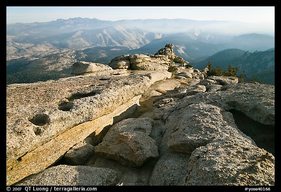 Summit of Mount Hoffman with hazy Yosemite Valley in the distance. Yosemite National Park, California, USA.