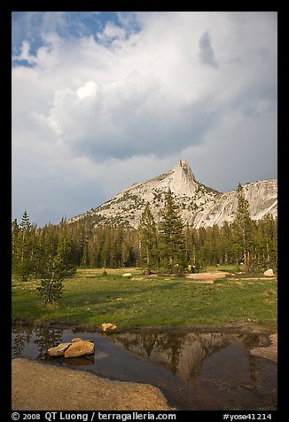 Meadow, Cathedral Peak, and clouds. Yosemite National Park, California, USA.