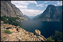 Father hiking with boy next to Hetch Hetchy reservoir. Yosemite National Park ( color)