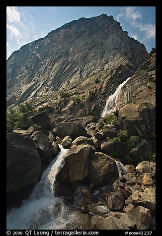Wapama falls and rock wall, late summer afternoon. Yosemite National Park, California, USA.
