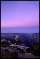 Half-Dome and Yosemite Valley under  pink hues of dawn sky. Yosemite National Park, California, USA. (color)