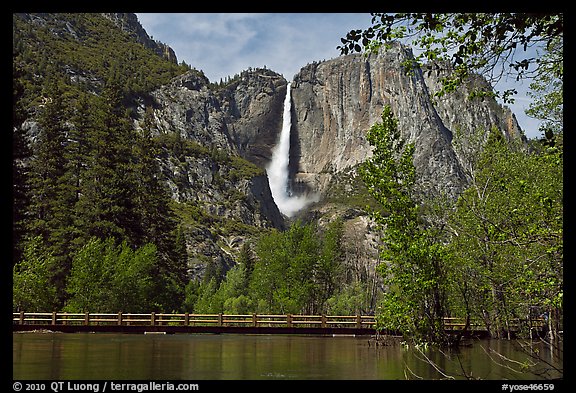 High waters of the Merced River under the Swinging Bridge. Yosemite National Park, California, USA.