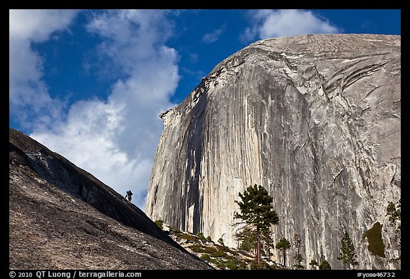 Hiker near Diving Board and Half-Dome. Yosemite National Park (color)