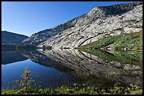 Peaks reflected in mirror-like waters, Merced Lake. Yosemite National Park ( color)