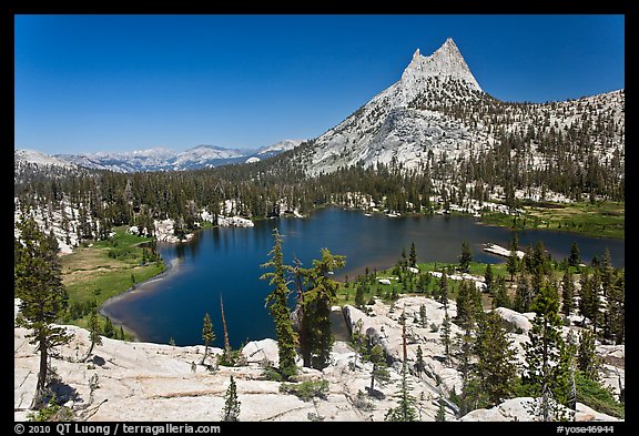 Upper Cathedral lake and Cathedral Peak, mid-day. Yosemite National Park, California, USA.