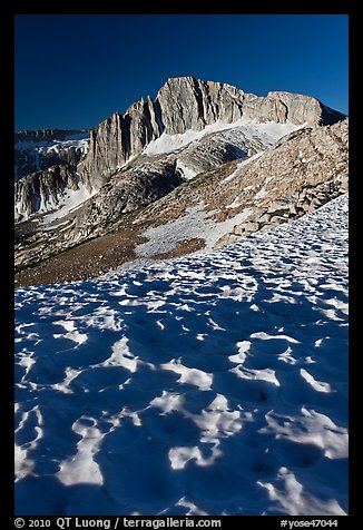 Neve with sun cups on the Sierra Crest, and North Peak. Yosemite National Park (color)