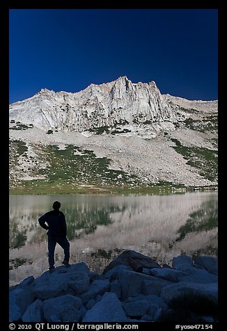 Hiker standing  on Roosevelt lakeshore. Yosemite National Park (color)