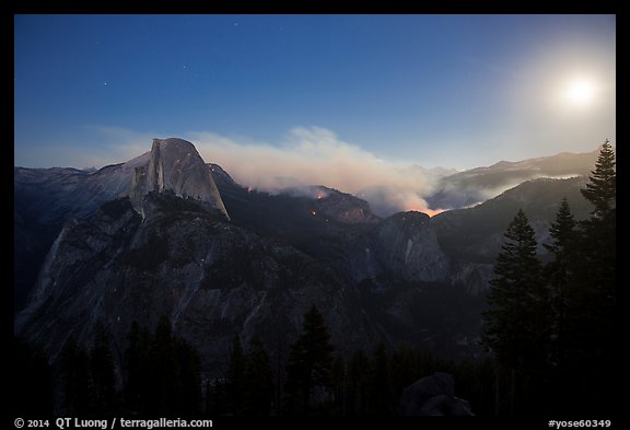 Half-Dome, fire, and moon. Yosemite National Park, California, USA.