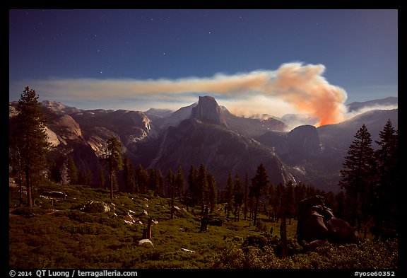 Half-Dome and plume of smoke from forest fire at night. Yosemite National Park (color)
