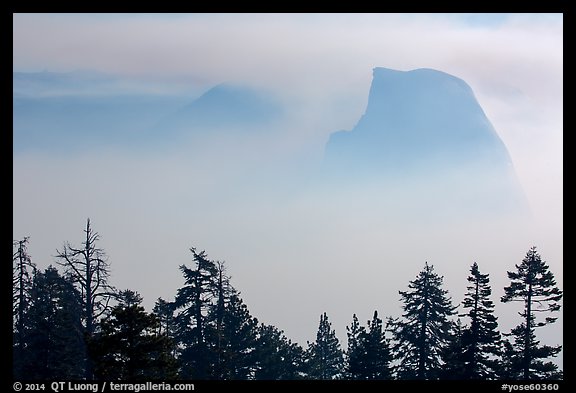 Half-Dome and Clouds Rest emerging from smoke. Yosemite National Park (color)