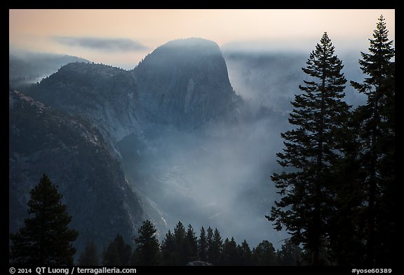 Liberty cap and smoke at night. Yosemite National Park, California, USA.