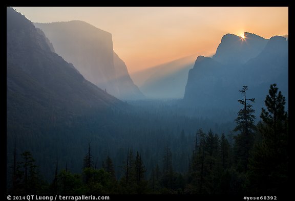 Discovery view with sun rising in notch. Yosemite National Park, California, USA.