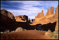 South park avenue, an open canyon flanked by sandstone skycrapers. Arches National Park, Utah, USA. (color)