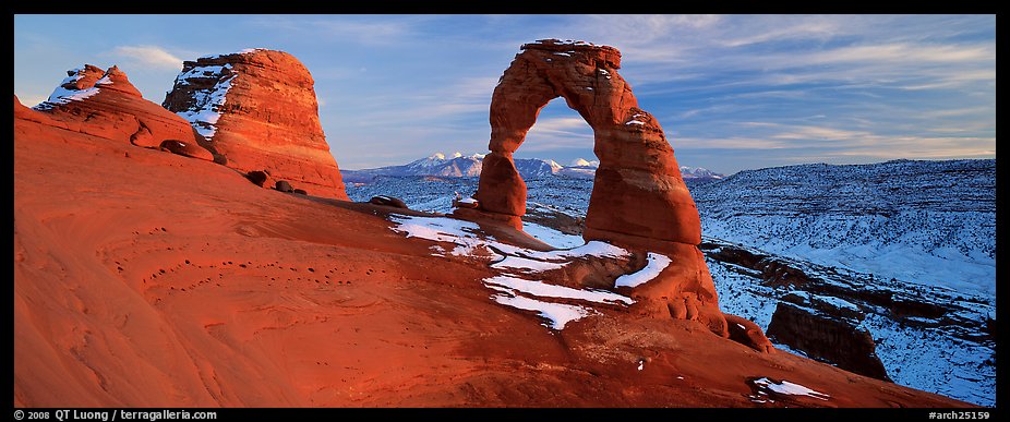 Desert Arch and mountains at sunset. Arches National Park (color)