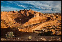 Entrada Sandstone basin with Delicate Arch in distance. Arches National Park ( color)