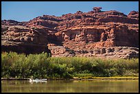 Canoeists and cliffs, Colorado River. Canyonlands National Park, Utah, USA. (color)