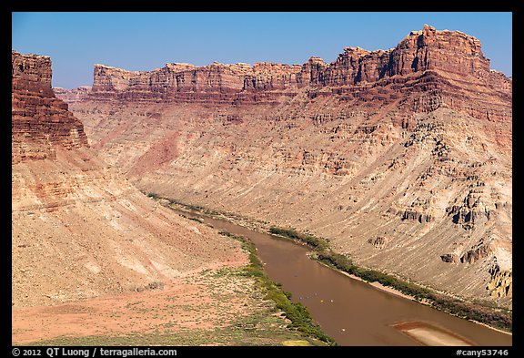 Distant views of rafts floating Colorado River. Canyonlands National Park, Utah, USA.