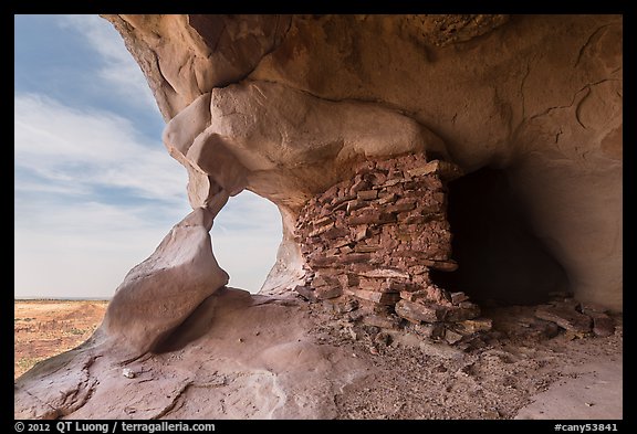Granary and natural rock arch, Aztec Butte. Canyonlands National Park, Utah, USA.