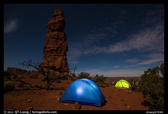 Tents at night below Standing Rock. Canyonlands National Park, Utah, USA.