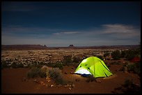 Tent overlooking the Maze at night. Canyonlands National Park, Utah, USA.