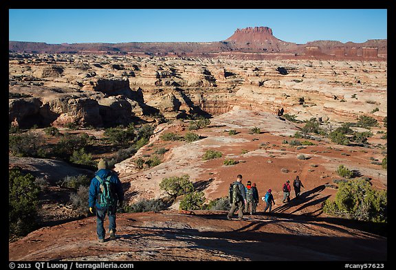 Group hiking down into the Maze. Canyonlands National Park, Utah, USA.