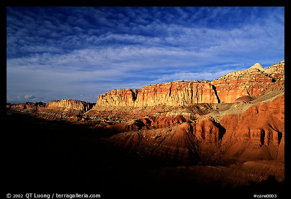 Layers of rock on  West face of Waterpocket Fold at sunset. Capitol Reef National Park, Utah, USA.
