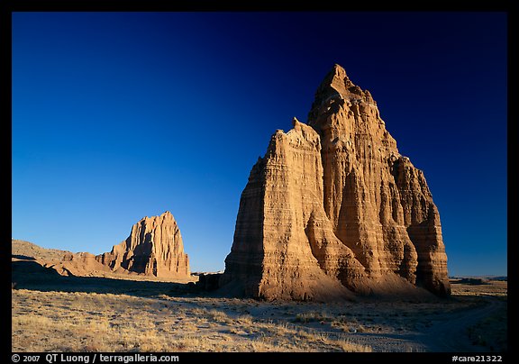Temple of the Moon in the foreground and temple of the Sun, sunrise, Cathedral Valley. Capitol Reef National Park (color)