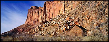 Fruita pioneer school house at the base of sandstone cliffs. Capitol Reef National Park (Panoramic color)